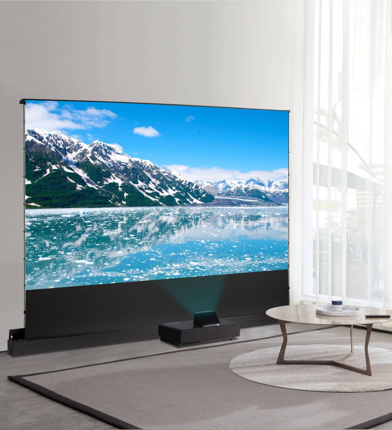 Grobi.TV - Celexon Motorische Bodenleinwand HomeCinema Plus für LASER TV Frontansicht mit Einrichtungsbeispiel