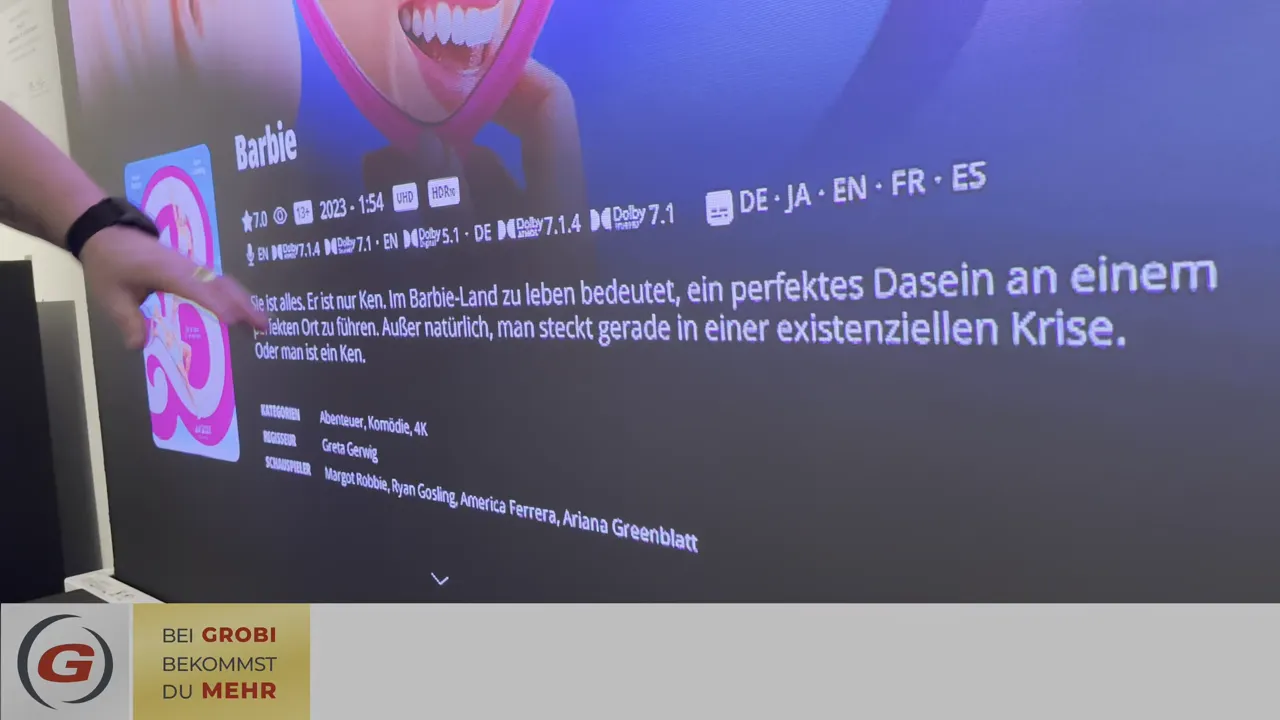 Filmdetailseite zu Barbie mit Cover, technischen Symbolen und Inhaltsbeschreibung