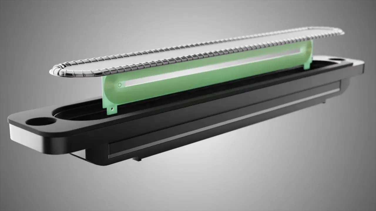 Gerenderte Darstellung eines schmalen Lautsprechertreibers mit grünen Magnetelementen